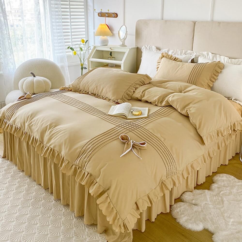 Conjunto de lençóis de veludo de leite elegantes e confortáveis com decoração de laço e saia de cama