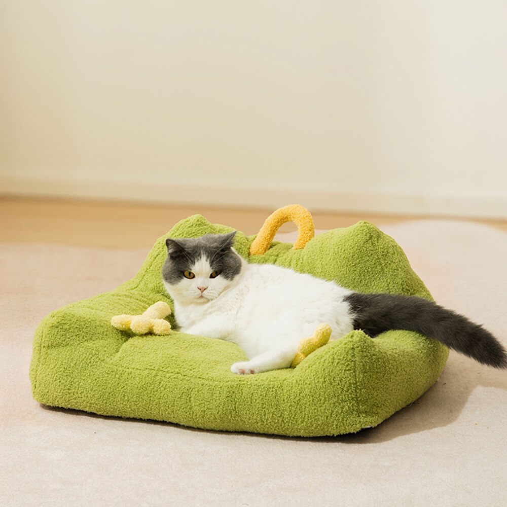 Cama de sofá elevada para cães e gatos com design de monstro de pelúcia macia